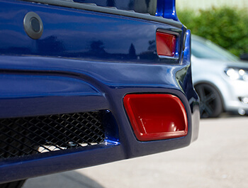 Red Exhaust Covers For Rear Valance - Ford Custom 2012>